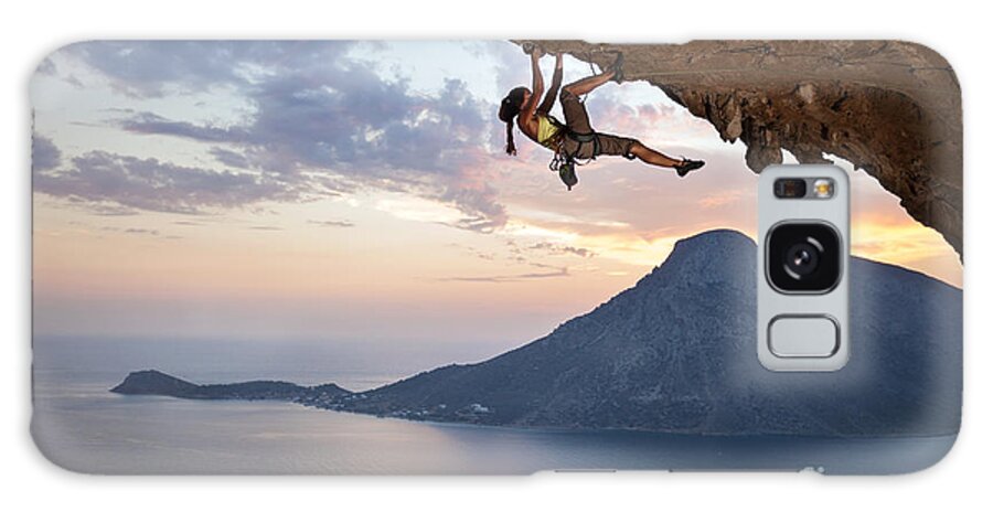 Beauty Galaxy Case featuring the photograph Young Female Rock Climber At Sunset by Photobac