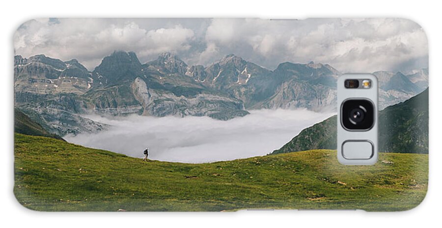 Young Woman Galaxy Case featuring the photograph Young Woman Hiking Through Pyrenees With Mount Aspe In The Background. by Cavan Images