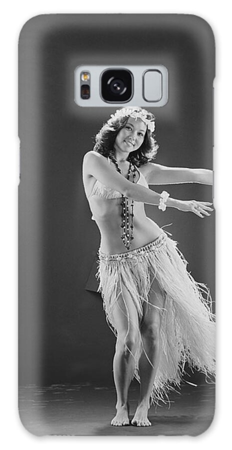 People Galaxy Case featuring the photograph Young Woman Hula Dancer Dancing On by Tom Kelley Archive