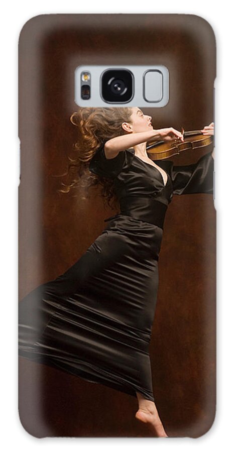 Expertise Galaxy Case featuring the photograph Young Woman Playing Violin And Jumping by Pm Images