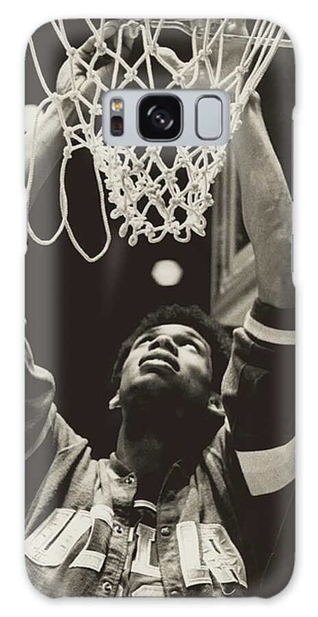 Lew Alcindor Galaxy Case featuring the photograph Lew Alcindor Cutting down the Net 1969 #1 by Malcom Emmons