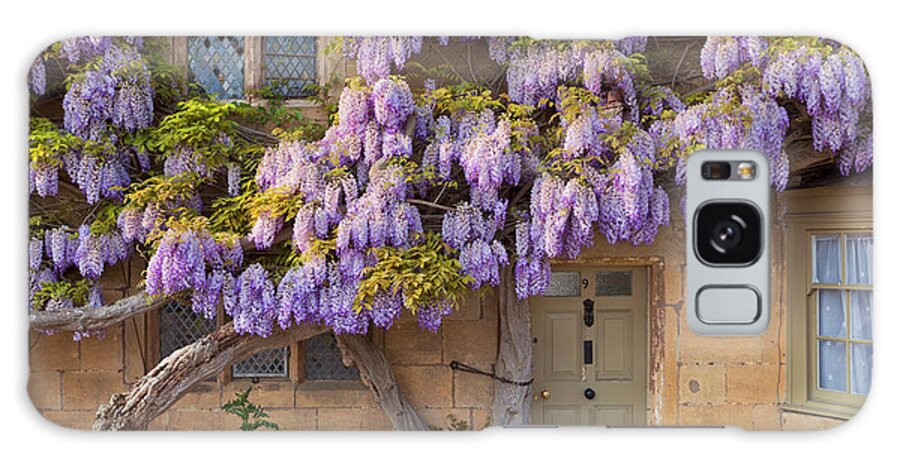 Broadway Cotswolds Galaxy Case featuring the photograph Wisteria on a Cotswolds stone cottage, Broadway, England by Neale And Judith Clark