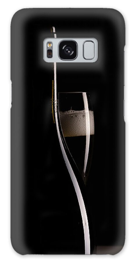 Red Wine Galaxy Case featuring the photograph Red sparking wine on a wineglass and black wine bottle. #3 by Michalakis Ppalis