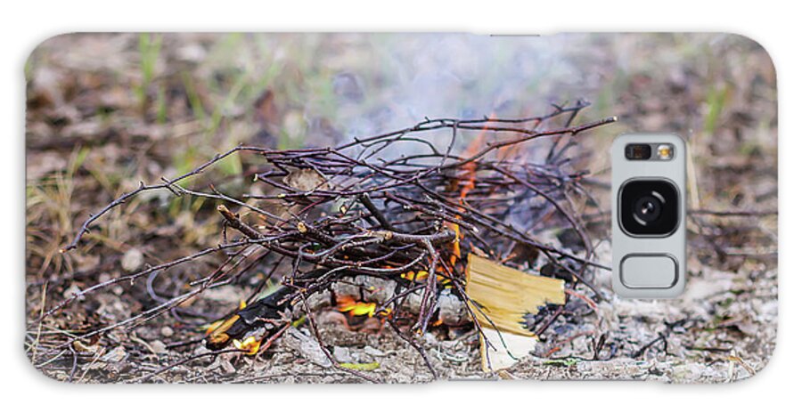 Bonfire Galaxy Case featuring the photograph Burning dry twigs. Bonfire at a camp in summer evening outdoors by Olga Strogonova