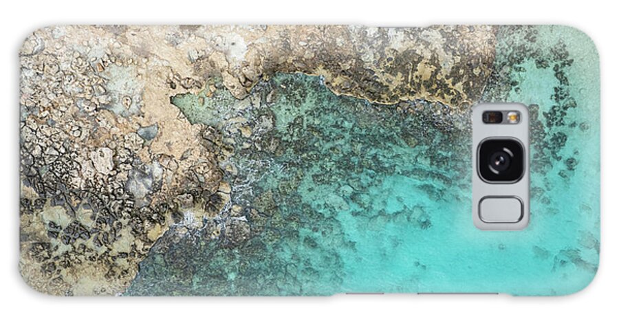Rocky Beach Galaxy Case featuring the photograph Drone aerial of rocky sea coast with transparent turquoise water. Seascape top view by Michalakis Ppalis