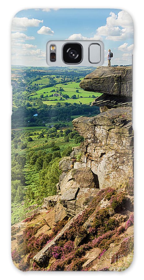 Derbyshire Galaxy Case featuring the photograph Hiker standing alone on Froggatt Edge, Derbyshire Peak District National Park, England by Neale And Judith Clark