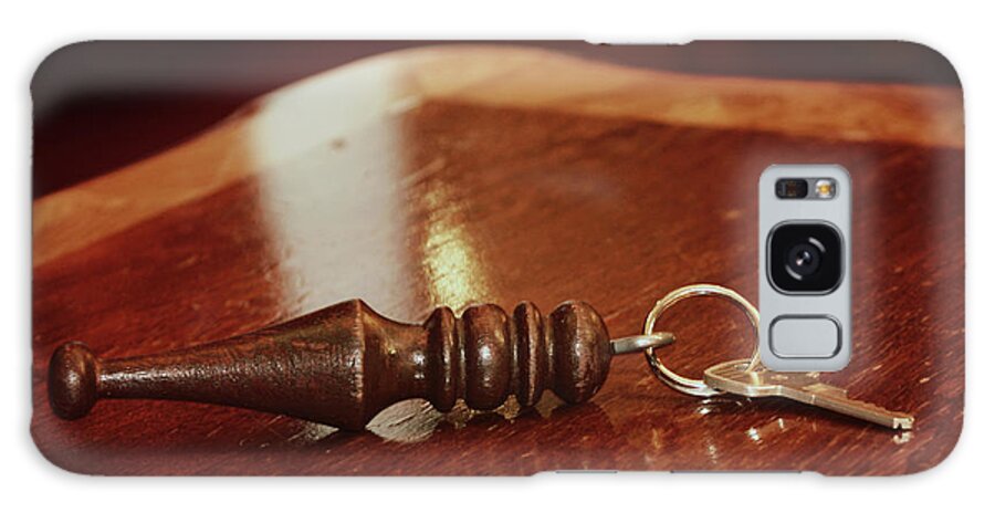 Key; Key Chain; Key Ring; Table; Wood; Metal; Castle; Horizontal; Warm; Reflection; Galaxy Case featuring the photograph Key to the Castle by Tina Uihlein