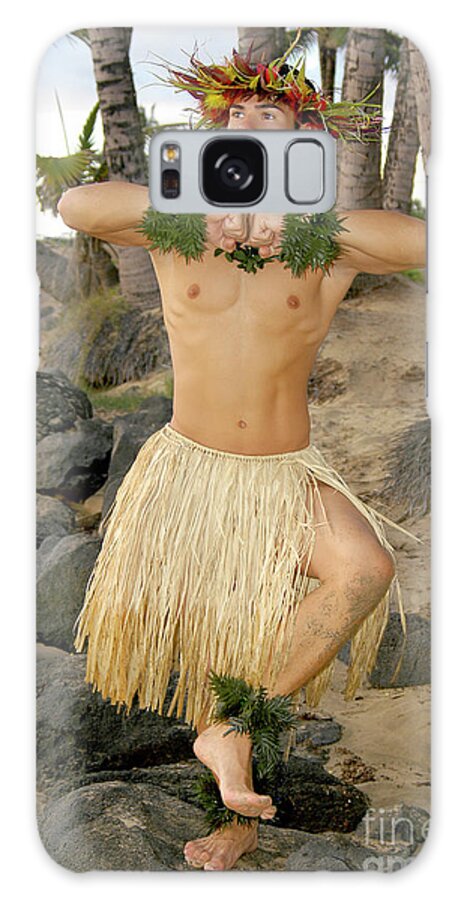 Male Hula Dancer Galaxy Case featuring the photograph Male hula dancer poses in front of palm trees on the beach.	 by Gunther Allen