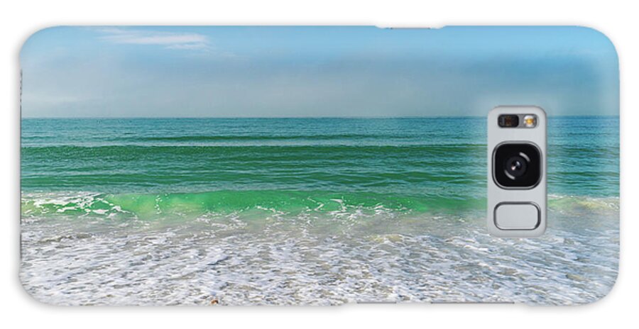 Color Image  Horizontal  St Pete Beach ×overcast ×morning ×beach ×gulf Of Mexico ×sand ×tranquility ×sea ×seascape ×florida - Usa State × ×water ×photography ×seagull ×no People ×scenics - Nature ×coastline ×sky ×nature ×cloud - Sky ×travel ×travel Destinations × Galaxy Case featuring the photograph Morning Beach Wave by Marian Tagliarino