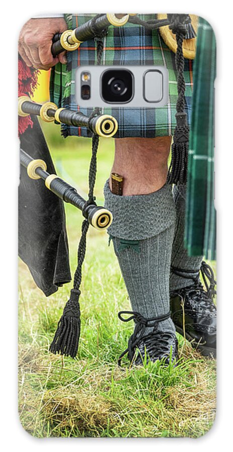 Bagpiper Galaxy Case featuring the photograph Scottish bagpipers by Delphimages Photo Creations