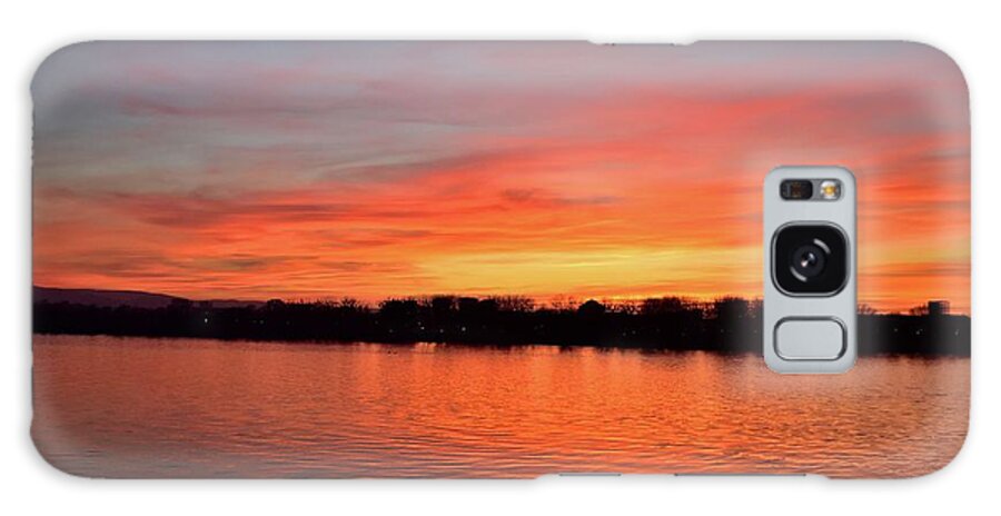 Nature Galaxy Case featuring the photograph Sunset draped in vermilion over the river by Leonida Arte