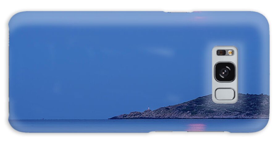 Moon Galaxy Case featuring the photograph Supermoon rising behind clouds above the sea by Alexios Ntounas