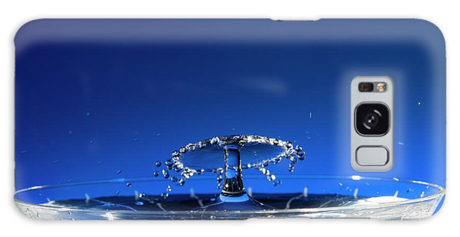 North Wilkesboro Galaxy Case featuring the photograph Water Drops Collide Over Martini Glass Blue by Charles Floyd