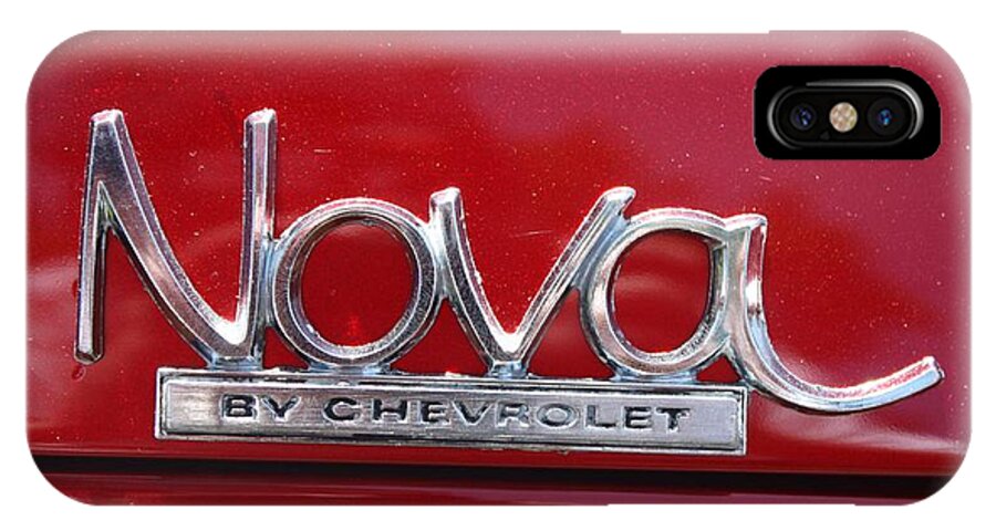 1970 Chevy Nova Logo iPhone X Case featuring the photograph 1970 Chevy Nova Logo by John Telfer