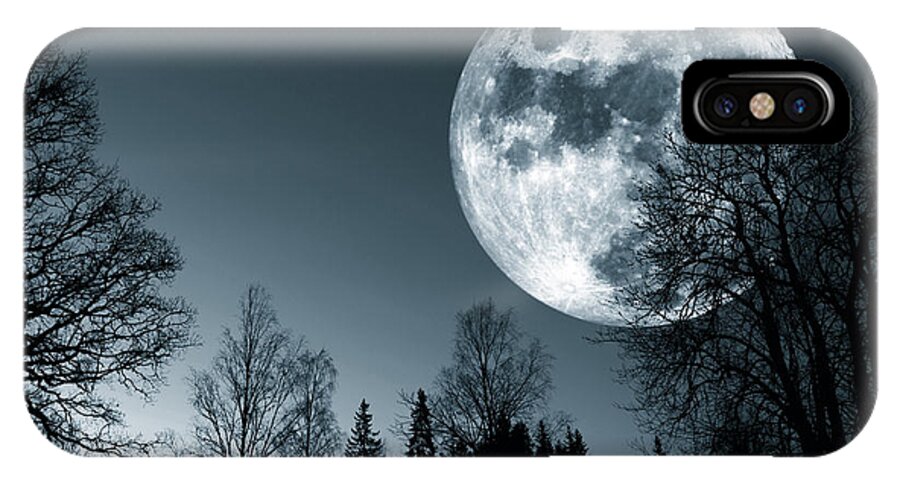 Moon iPhone X Case featuring the photograph Full Moon Over Dark Forest by Christian Lagereek