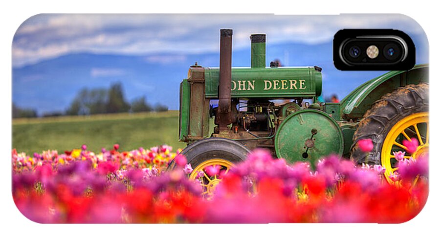 John iPhone X Case featuring the photograph John Deere in the Tulips by Joseph Bowman