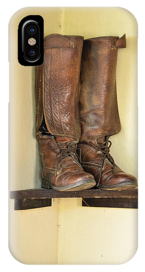 2014 iPhone X Case featuring the photograph Leather Boots on Shelf Jamaica by RobLew Photography