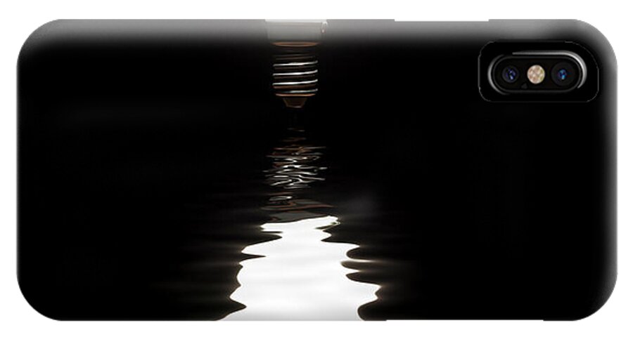  Light Bulb iPhone X Case featuring the photograph Light bulb shining with reflection in water on black by Simon Bratt