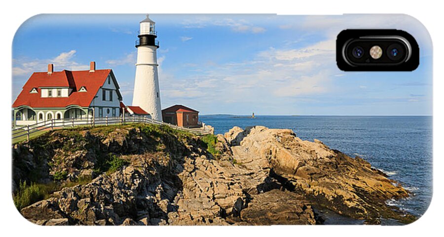 Lighthouse iPhone X Case featuring the photograph Lighthouse in the sun by Sue Leonard