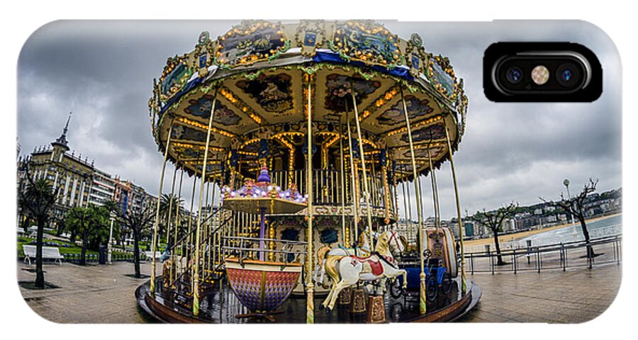 Merry iPhone X Case featuring the photograph Merry-go-Round by Pablo Lopez