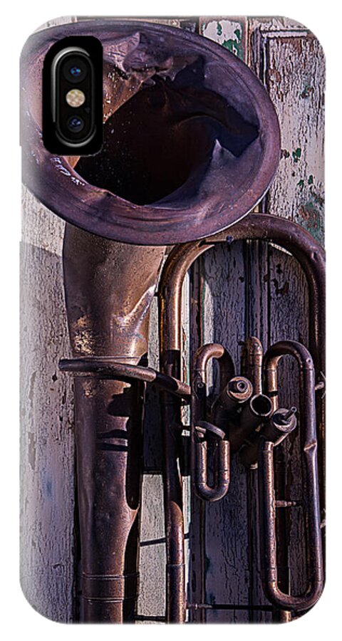 Old iPhone X Case featuring the photograph Old tuba on worn door by Garry Gay