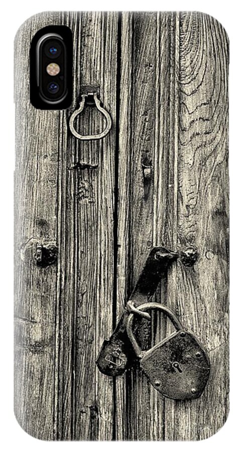 Abstract iPhone X Case featuring the photograph Old Weathered Door by Nicola Fiscarelli