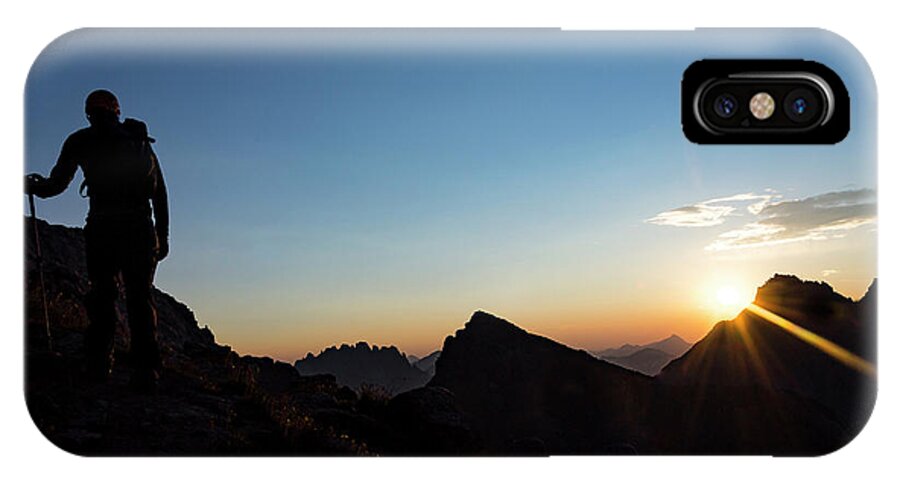 Usa iPhone X Case featuring the photograph Silhouette Of A Person At Sunrise by Taylor Reilly