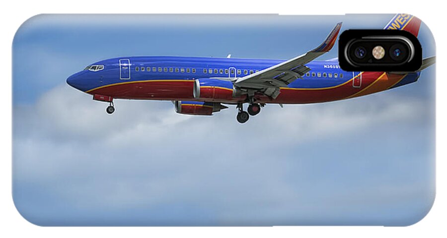 Southwest Airlines Jet iPhone X Case featuring the photograph Southwest Airlines Jet by D Wallace