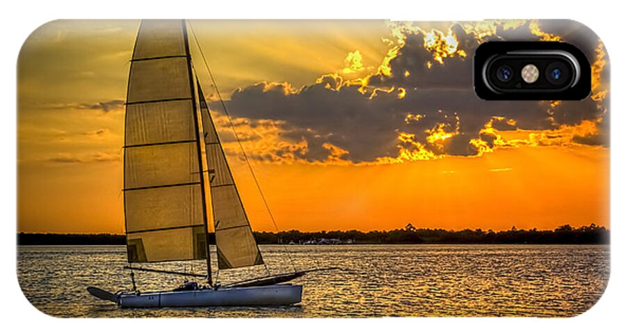 Boats iPhone X Case featuring the photograph Sunset Sail by Marvin Spates
