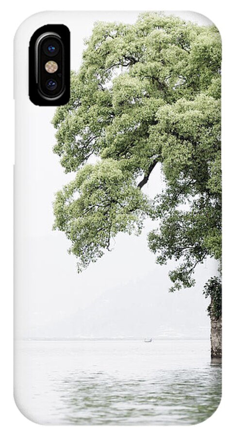 Tree iPhone X Case featuring the photograph Tree next to a lake by Dutourdumonde Photography