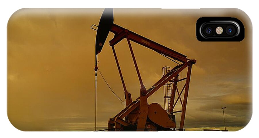 Oil iPhone X Case featuring the photograph Wellhead At Dusk by Jeff Swan