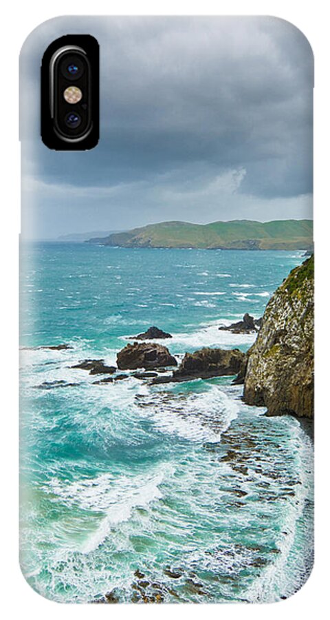 Background iPhone X Case featuring the photograph Cliffs under thunder clouds and turquoise ocean #1 by U Schade