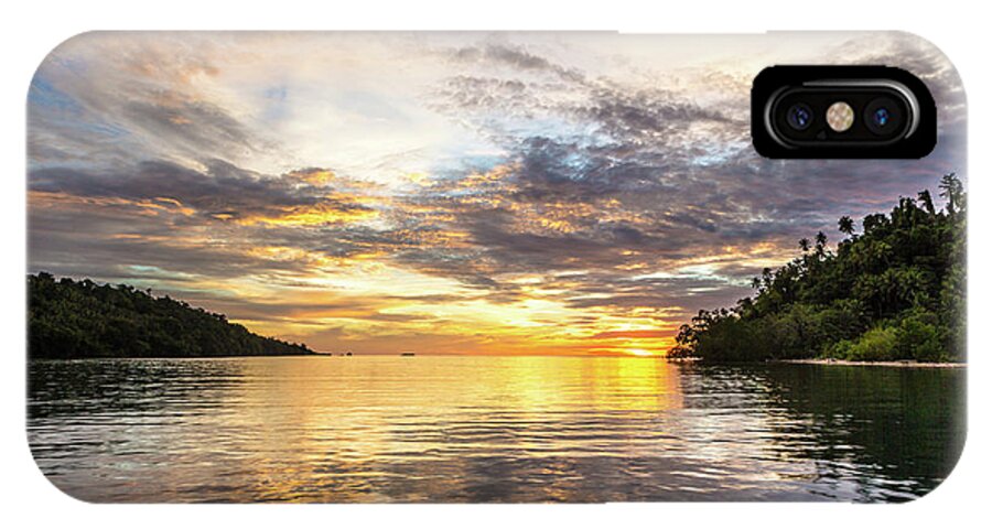 Indonesia iPhone X Case featuring the photograph Stunning sunset in the Togian islands in Sulawesi #1 by Didier Marti
