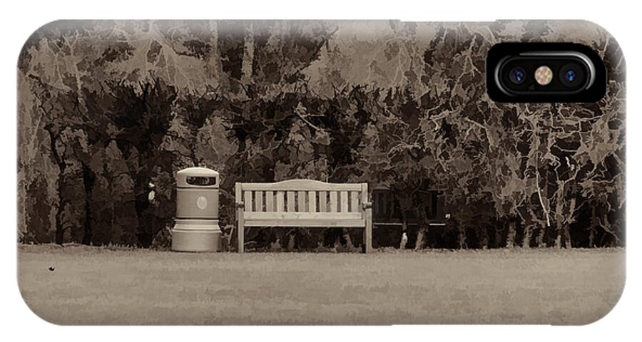 Bench iPhone X Case featuring the photograph A trash can and wooden benches in a small grassy area #3 by Ashish Agarwal