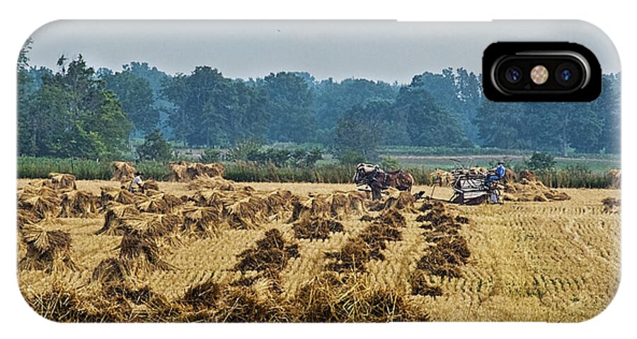 Amish iPhone X Case featuring the photograph Amish making Grain Shocks by David Arment