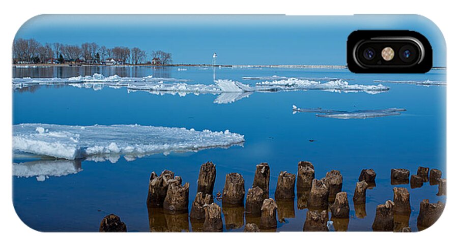 Grand Marais Michigan iPhone X Case featuring the photograph April Ice by Gary McCormick