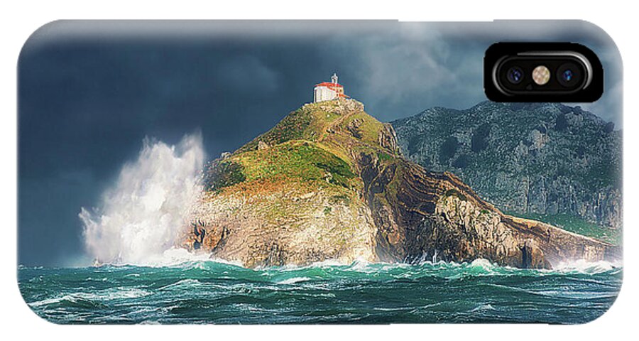 Gaztelugatxe iPhone X Case featuring the photograph Big waves over San juan de gaztelugatxe by Mikel Martinez de Osaba