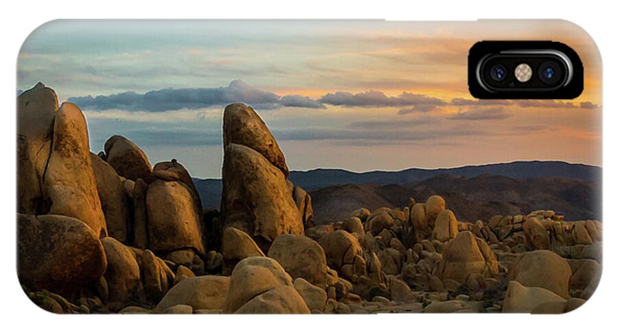 Sky iPhone X Case featuring the photograph Desert Rocks by Ed Clark