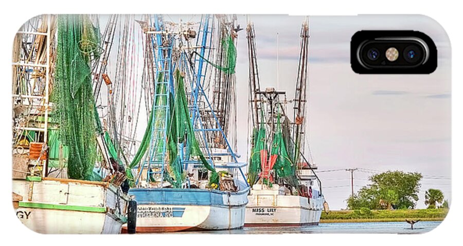 Dolphin iPhone X Case featuring the photograph Dolphin Tail - Docked Shrimp Boats by Scott Hansen