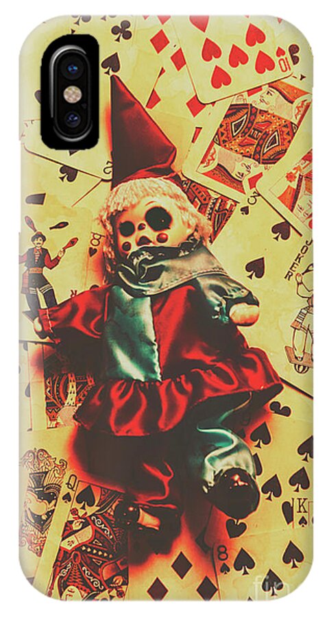 Doll iPhone X Case featuring the photograph Evil clown doll on playing cards by Jorgo Photography