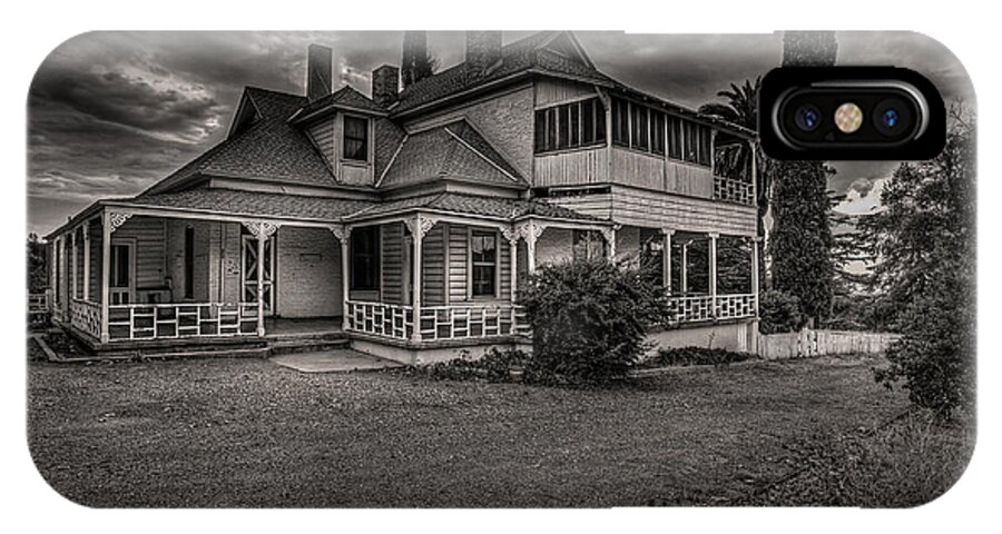 Black And White iPhone X Case featuring the photograph Storm Clouds over Old House by Rick Strobaugh