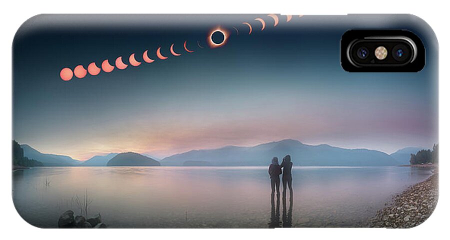 2017 iPhone X Case featuring the photograph Woman and girl standing in lake watching solar eclipse by William Lee