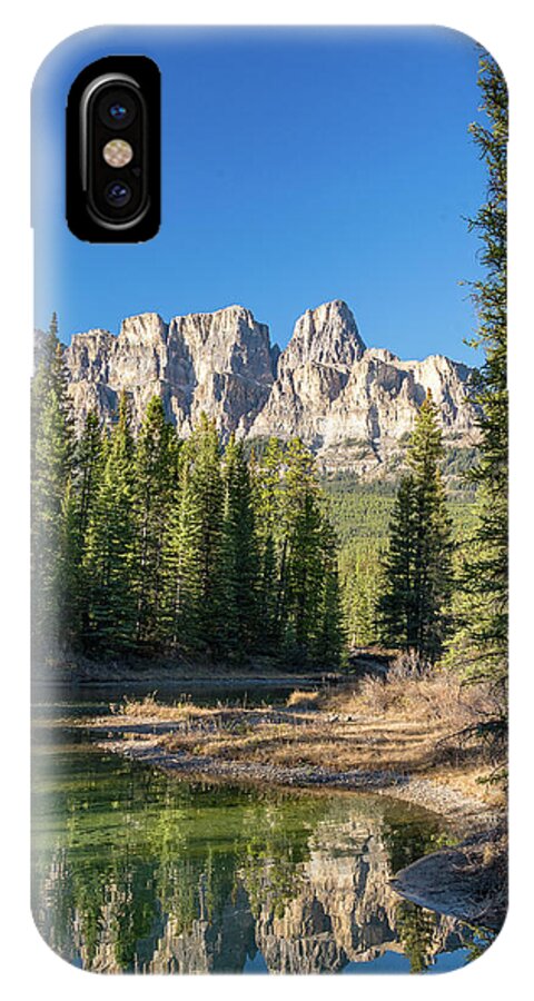 2015 iPhone X Case featuring the photograph Castle Cliffs and Reflections by Tim Kathka