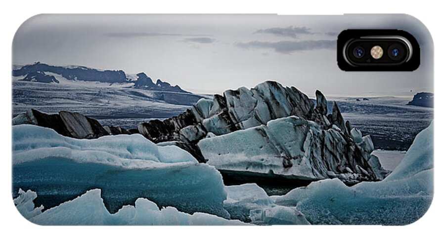 Iceland iPhone X Case featuring the photograph Icy Stegosaurus by Jim Cook