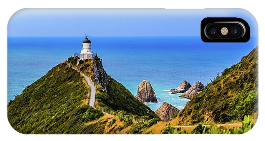 Lighthouse iPhone X Case featuring the photograph Nugget Point lighthouse, New Zealand by Lyl Dil Creations