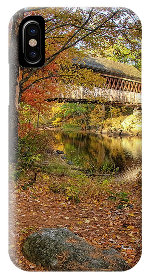 The Gorgeous Henniker Covered Bridge On A Beautiful Fall Day In October Seen Throuh The Woods. Henniker iPhone X Case featuring the photograph Covered Bridge in Autumn #1 by Donna Doherty