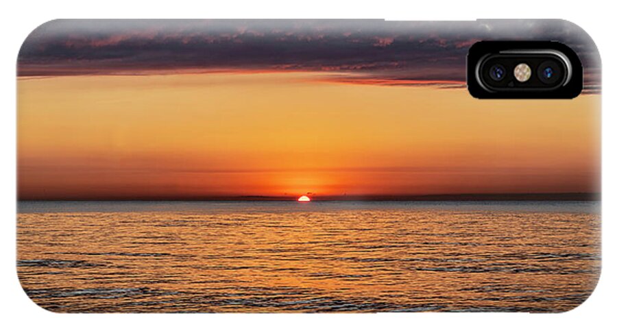 Sun Rise iPhone X Case featuring the photograph Sun peaks over watery horizon by Sven Brogren