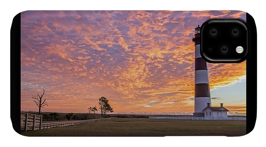 Outer Banks iPhone 11 Case featuring the photograph Bodie Island Lighthouse at Sunrise by Photographic Arts And Design Studio