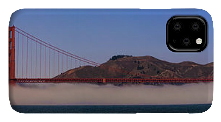 Horizontal iPhone 11 Case featuring the photograph Golden Gate Bridge over fog Panorama by Chris Bordeleau