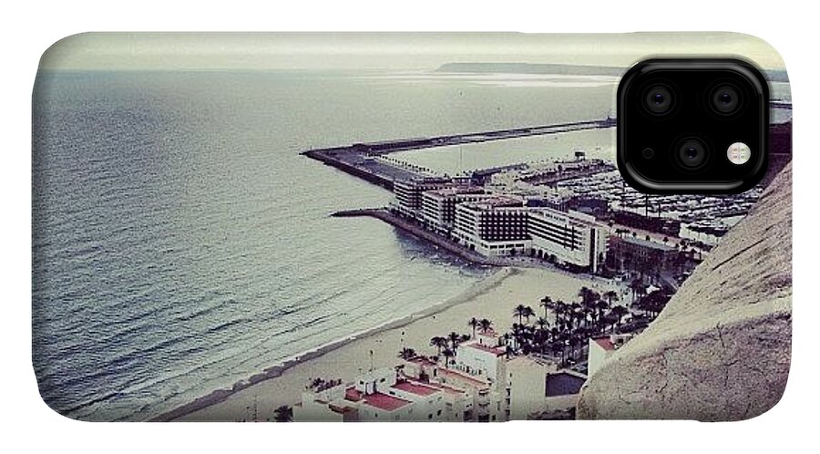 Lonely iPhone 11 Case featuring the photograph #mgmarts #spain #seaside #sea #view by Marianna Mills